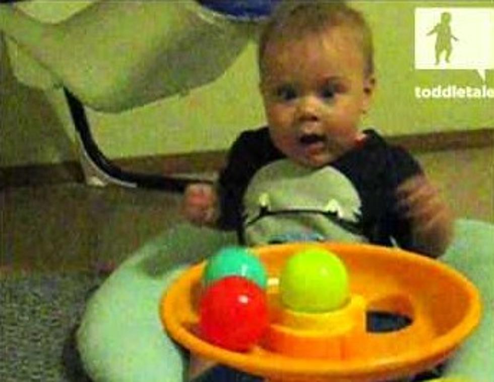 Cute Baby Mesmerized By Ball Toy [VIDEO]