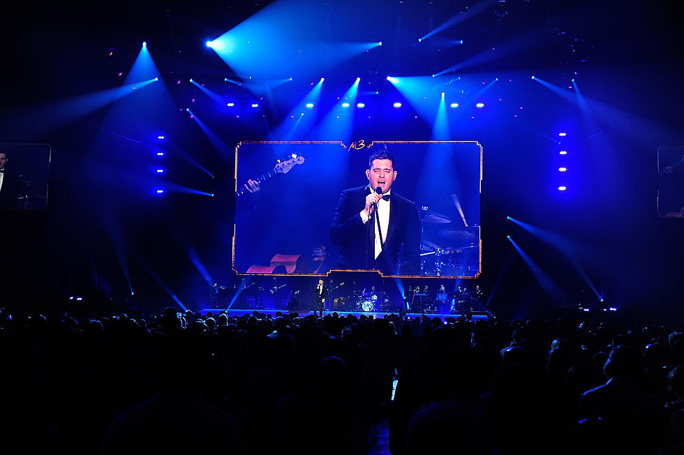 Michael Buble Shows His Charm, Lets Fan Sing With Him