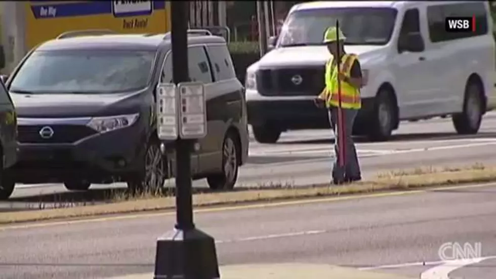 See Cops Dress As Construction Workers To Bust Drivers Texting