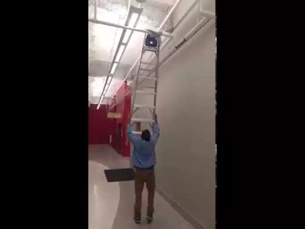 Here Is How NOT To Use A Ladder