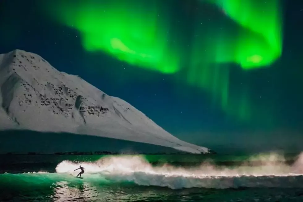 Check Out This Crazy Guy Surfing Under The Northern Lights!