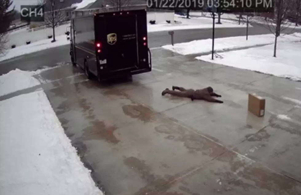 UPS Driver Gives it His All On Super Icy Driveway 