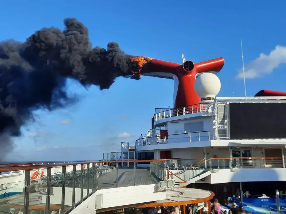 Photos Show a Carnival Cruise Ship Currently on Fire, Docked at Grand Turk