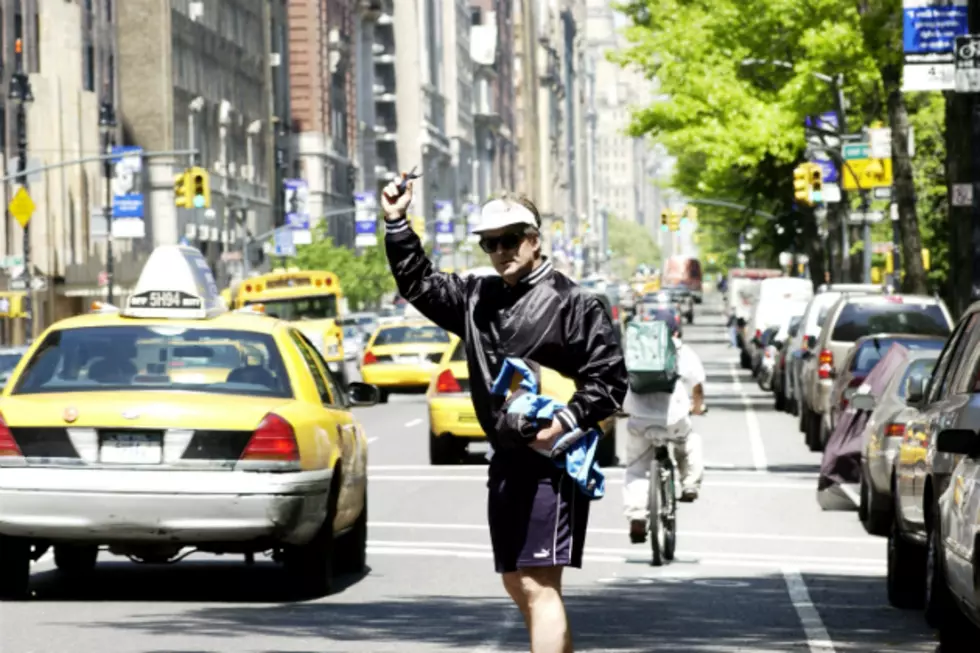 Guy High-Fives Cab Hailers in NYC [VIDEO]