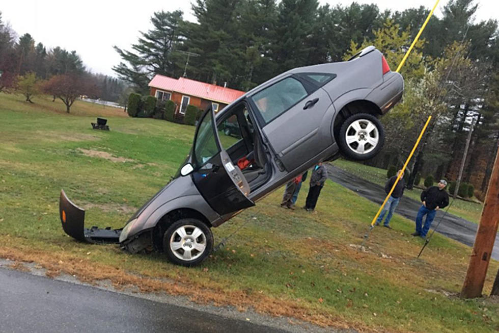 Teen Driver Takes Vertical Detour Up Utility Guy-Wire [PHOTO]