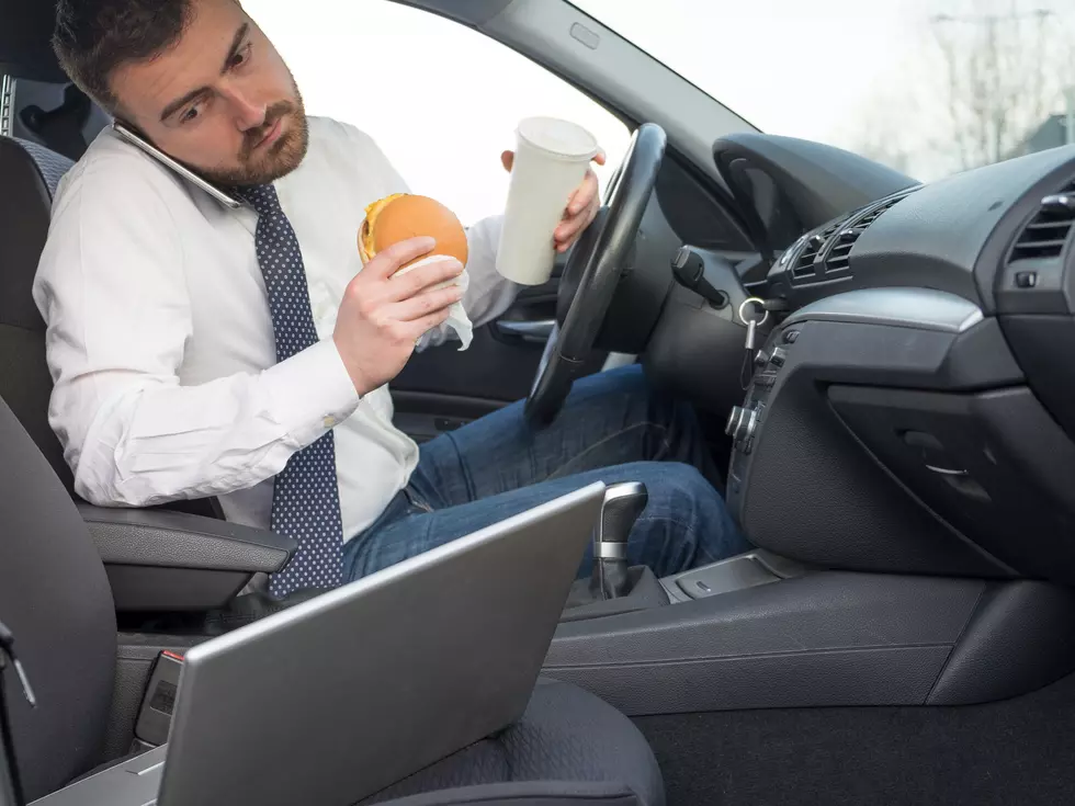 Should Eating Or Drinking Behind The Wheel Be Illegal Too?