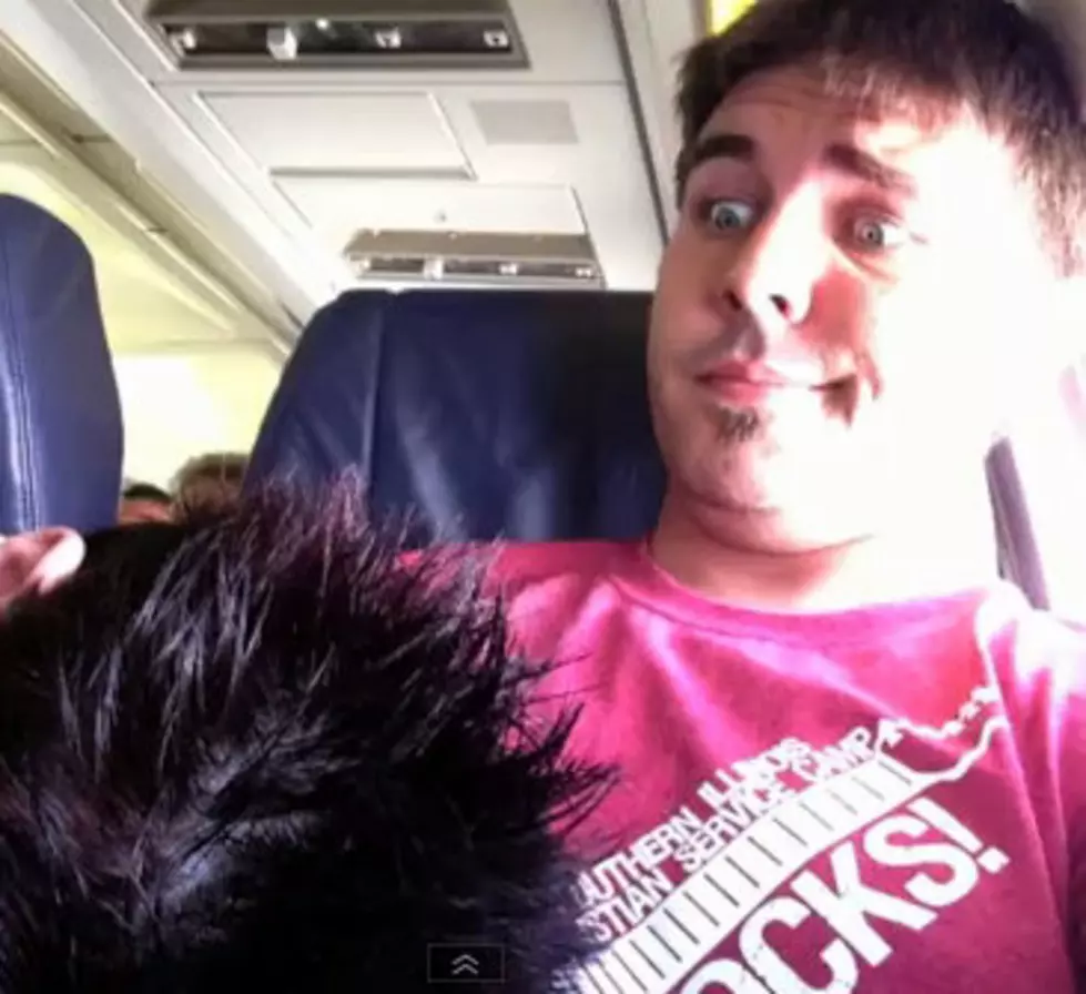 If Someone Fell Asleep on You in Mid-Flight, What Would You Do? [VIDEO + POLL]