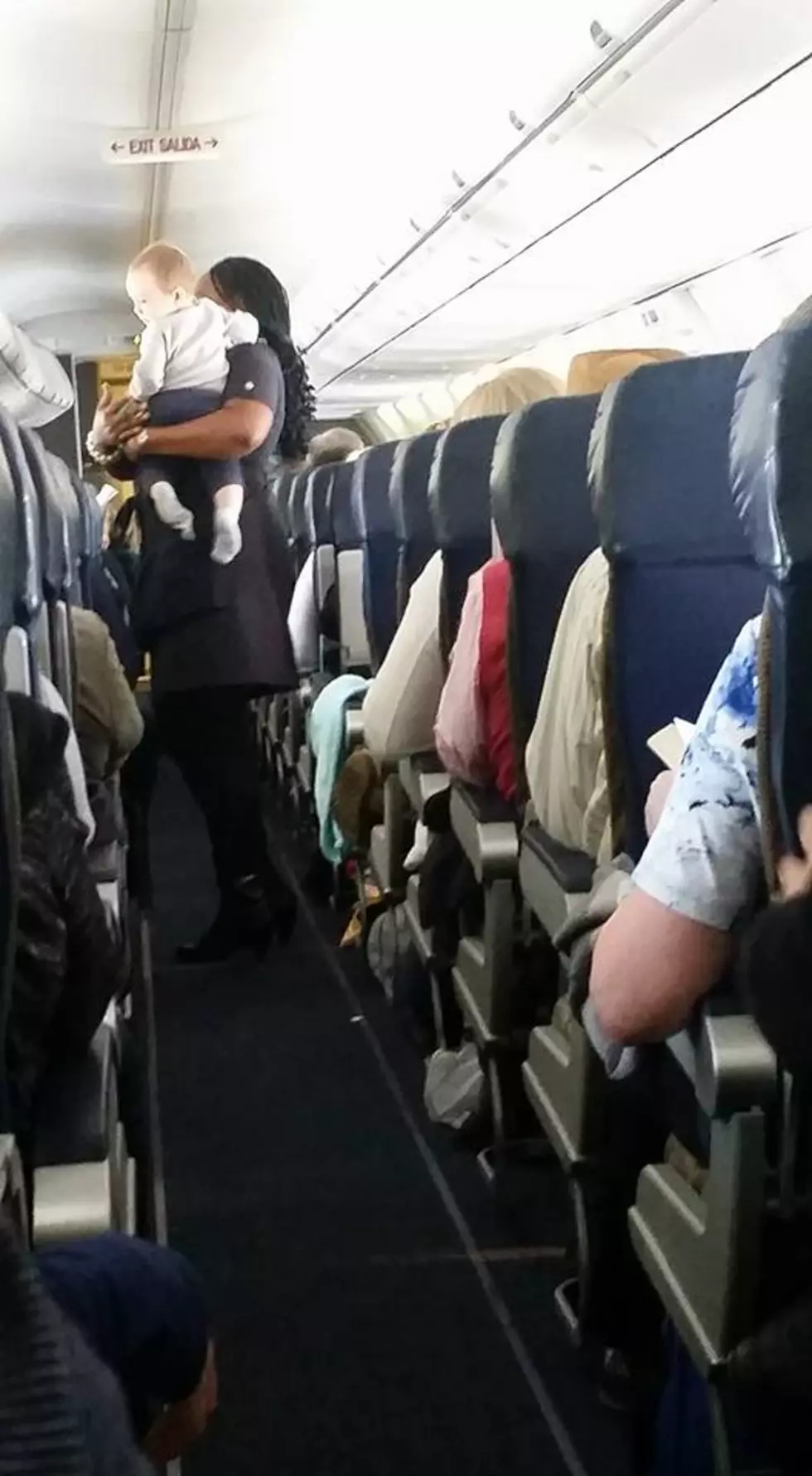 Flight Attendant Goes Viral After Calming Baby