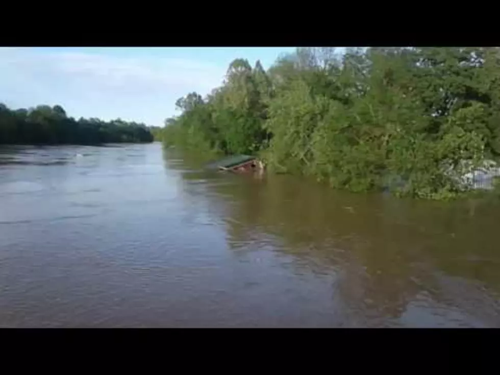 Cabin Crushed In Flood Waters