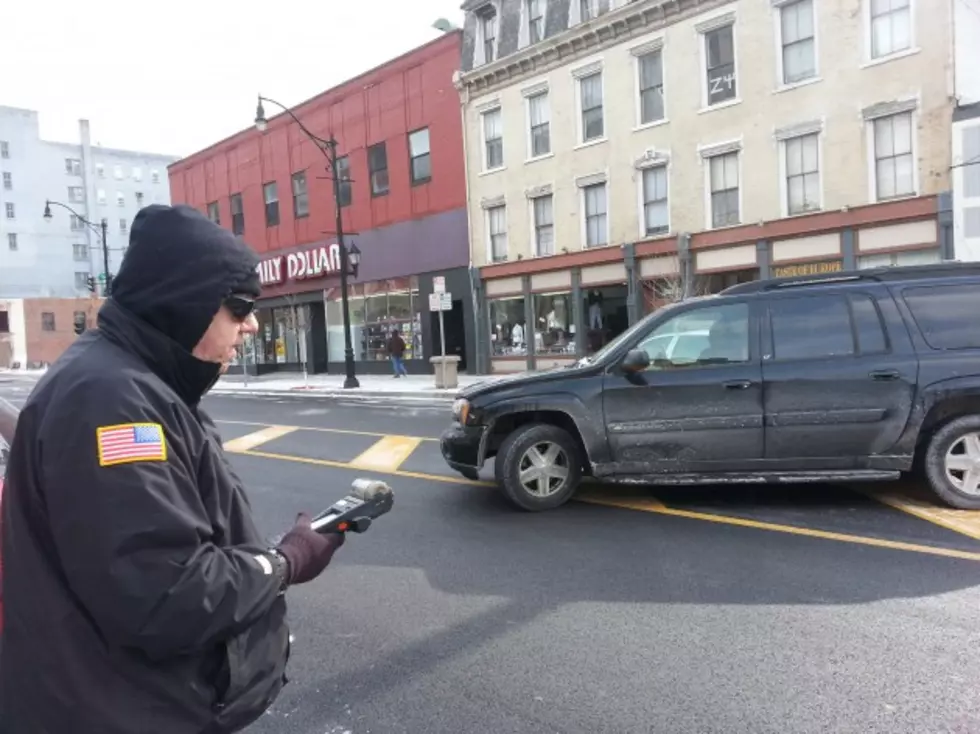 Driver Ignores Diagonal Parking Signs As Officer Issues Tickets