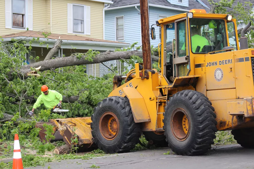 Johnson City village employees worked to remove storm damage on Grand Avenue. (Photo: Bob Joseph/WNBF News)