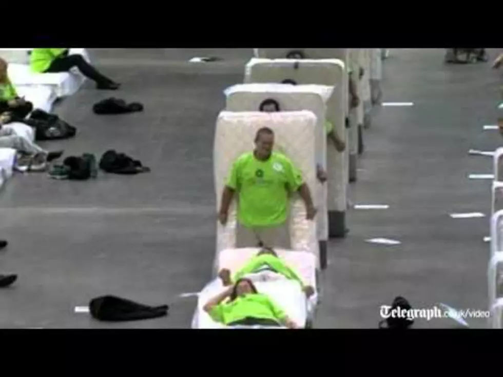 Daily Dose of Weird: ‘Human Mattress Domino-Toppling’ World Record Broken in New Orleans [VIDEO]