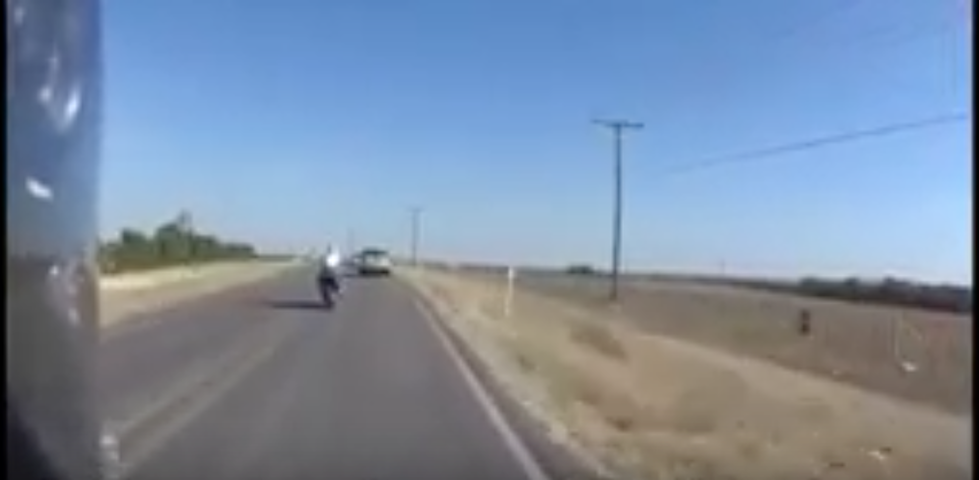 Driver of Car Intentionally Hits Motorcycle Trying to Pass [VIDEO]