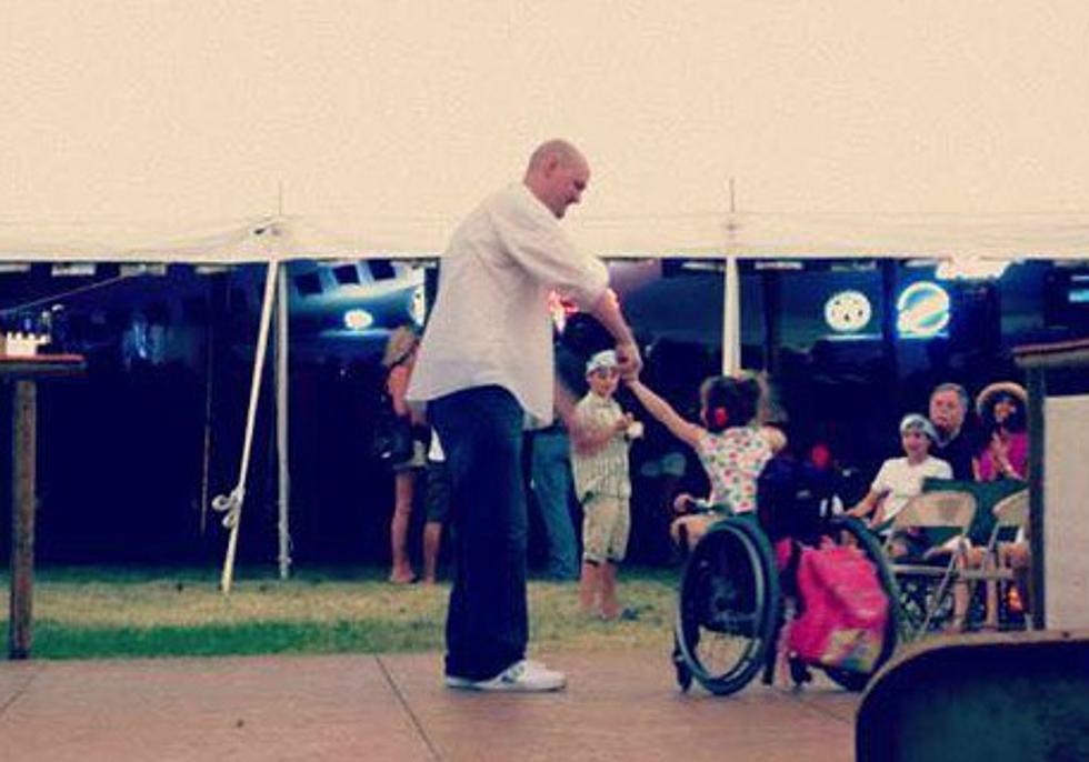 Father Dances With Daughter in Wheelchair at the Greeley Stampede