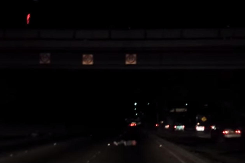 Watch This Guy Jump Off a Bridge, Hit the Ground Hard, and Nonchalantly Walk Away [VIDEO]