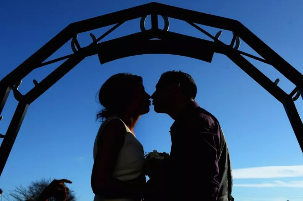 What is the Proper Way to Kiss at a Wedding Ceremony?