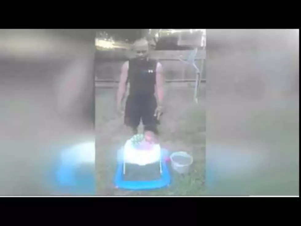 Did This Grandfather Cross the Line Drenching Infant in Ice Bucket Challenge?