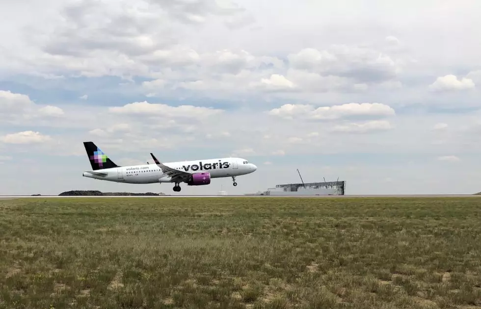 First International Flight Lands in Denver After 75 Days