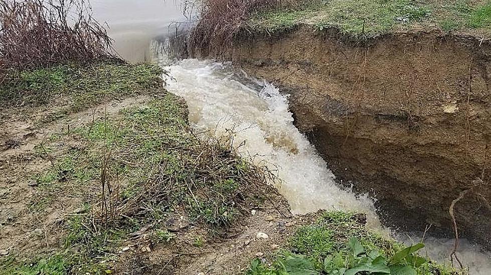 Water Breaches Local Dam