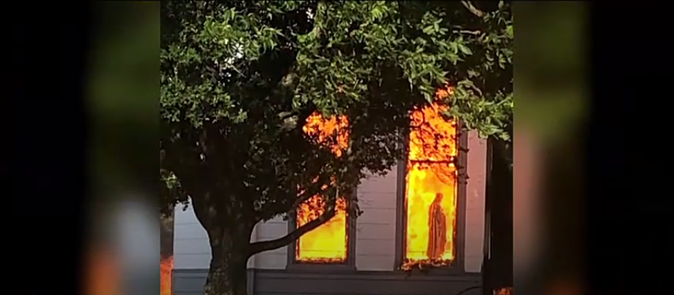 Virgin Mary Silhouetted in Flame at Westphalia Church Fire