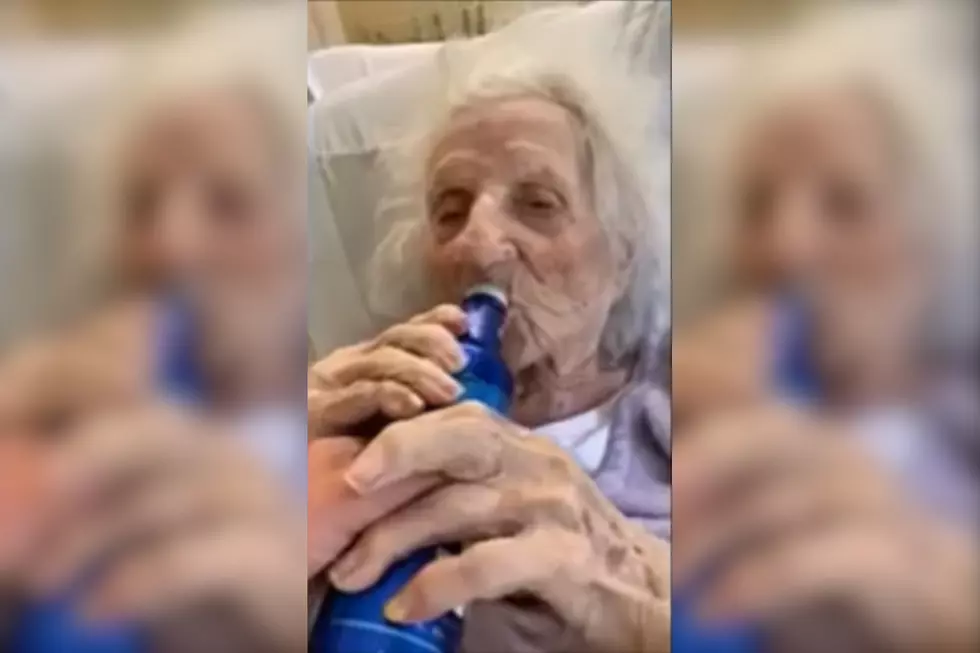 103 Year Old Woman Beats COVID 19 And Celebrates With A Beer
