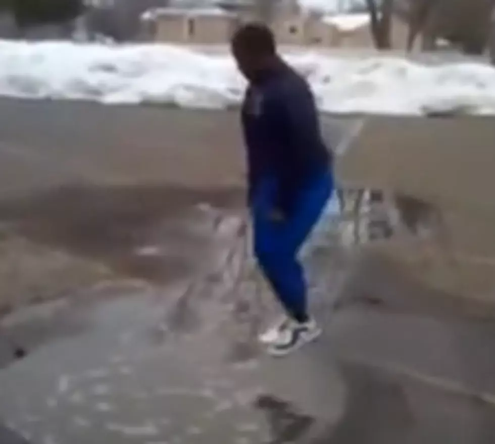 Teenager Makes Bad Bet and Jumps In A Puddle