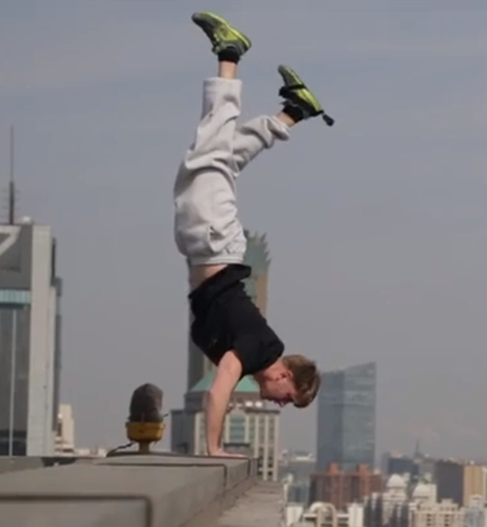 Daredevil Scott Young Performs Handstand on Top of 40 Story Building