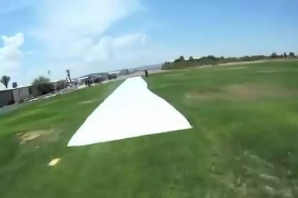 Watch a Parachute Landing on a Slip and Slide