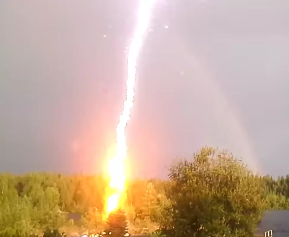 Lightning Strike Destroys Peaceful View of a Rainbow