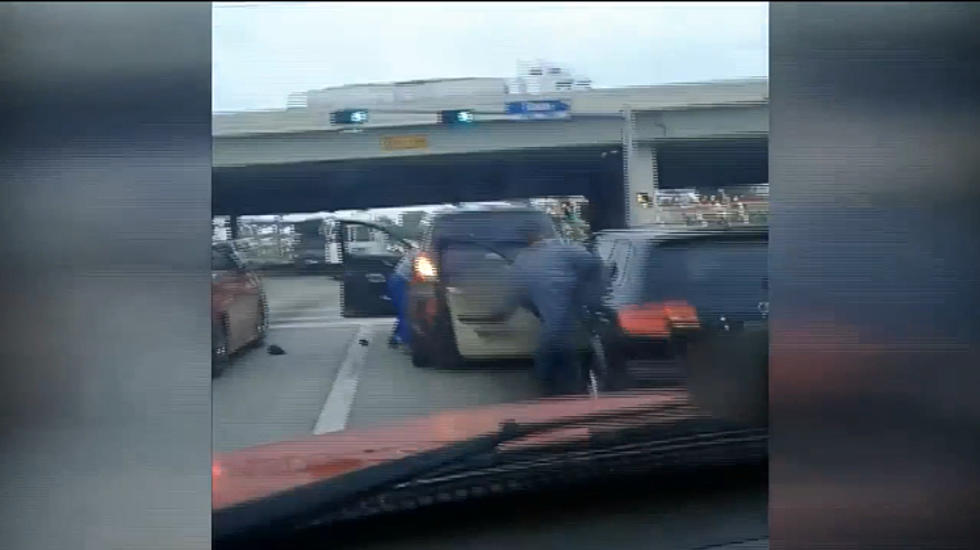 Watch a Man Steal a Car as Two Women Fight in Houston Traffic [VIDEO]
