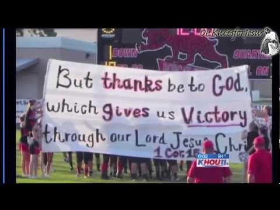 Texas judge rules for cheerleaders in Bible banner suit