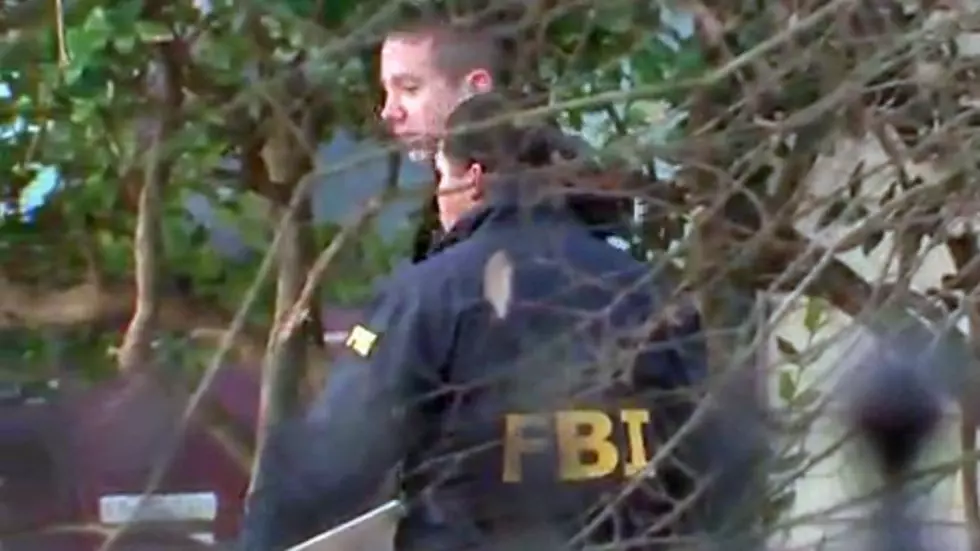 FBI Agent Kills Man in Raid