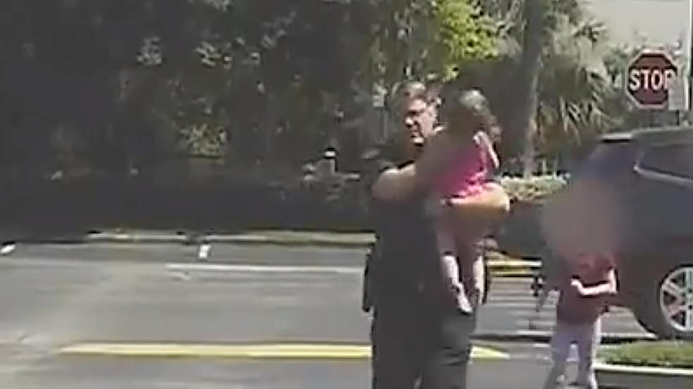 Video Shows Police Officer Rescuing Little Girl Left in Hot Car