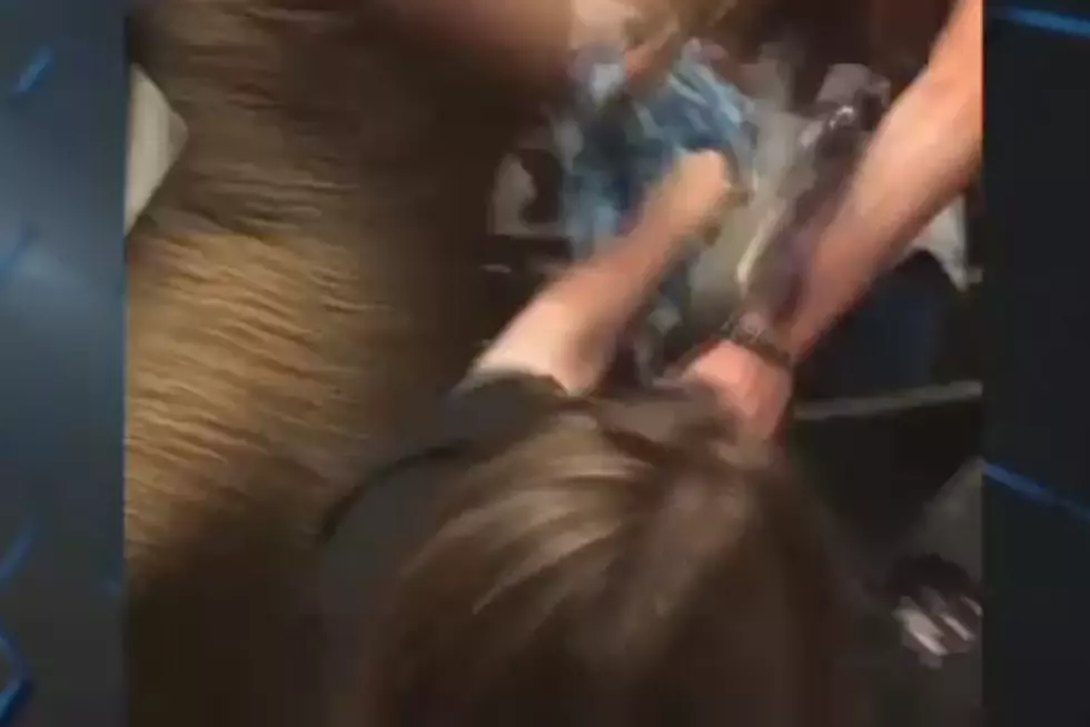 It&#8217;s A Girl Fight!  Two Women Fight Over Seats At Graduation In A Church! [Video]