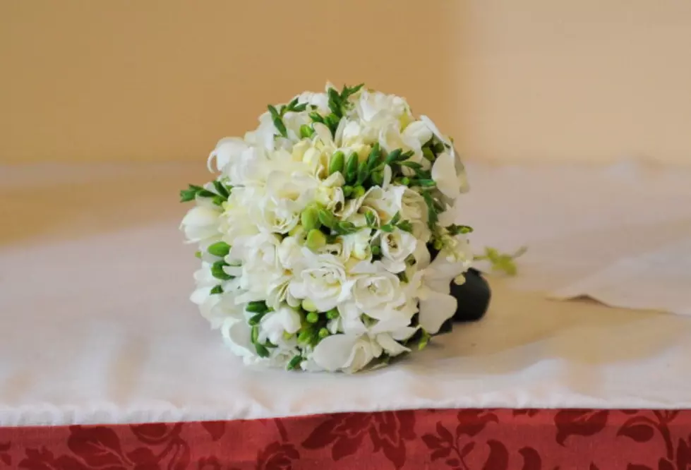 Surprise Proposal During Bouquet Toss [VIDEO]