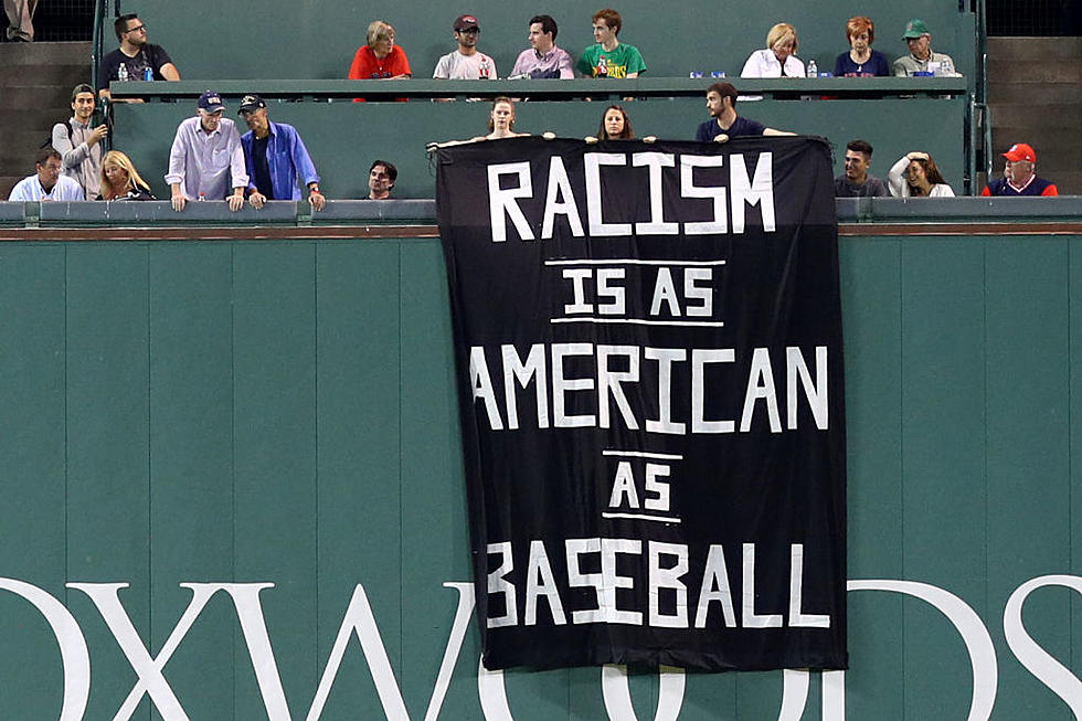 Racism Banner Draped Over Green Monster At Fenway Park