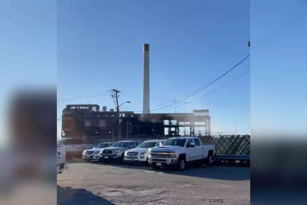 Watch New Bedford’s Landmark ‘Cigarette’ Smokestack Come Down in Implosion