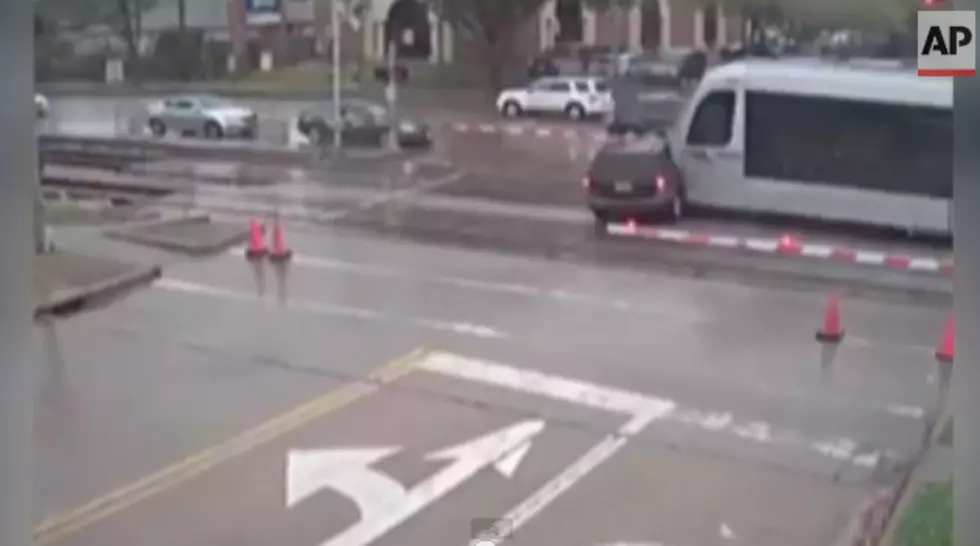 SUV Tries To Beat Train [VIDEO]