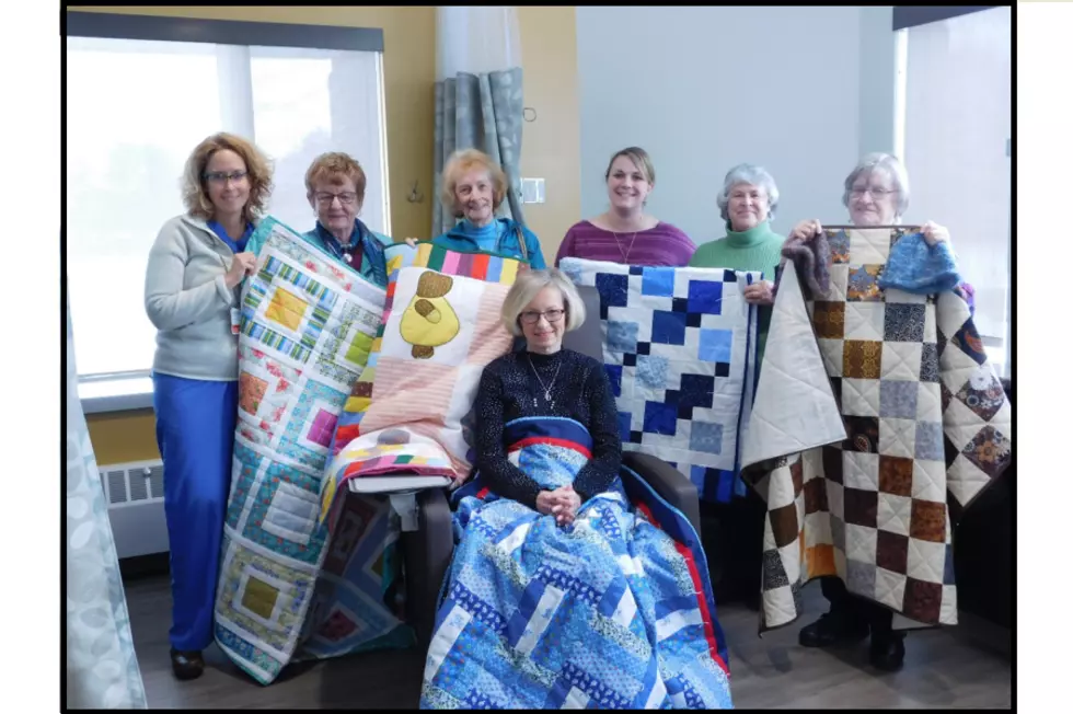 Adult Ed Quilters Donate Quilts to Cary Cancer Center