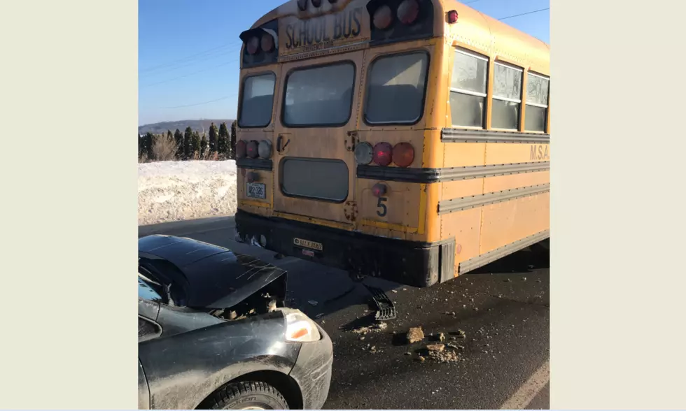 Car Strikes School Bus in Mapleton