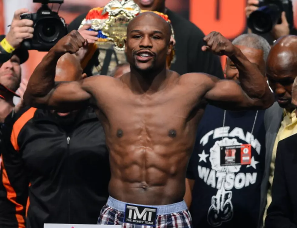 Floyd Mayweather Receives Check for $40 Million (PICTURE)