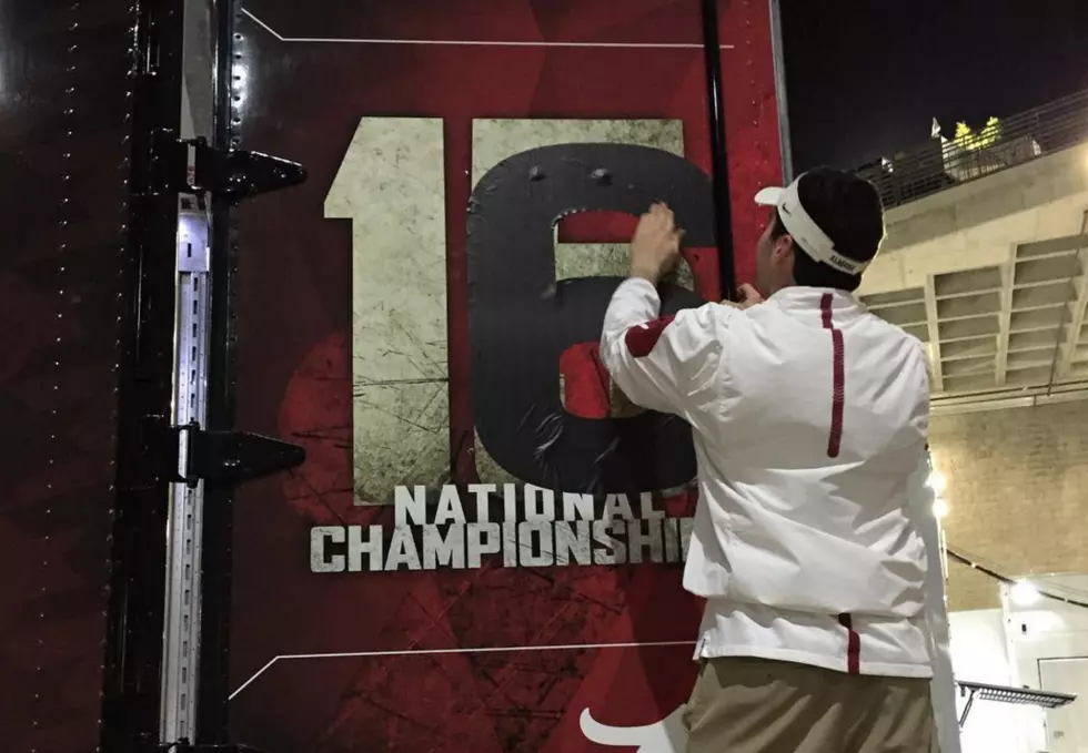 Alabama Updates National Championship Graphic on the Team Bus [PHOTO]