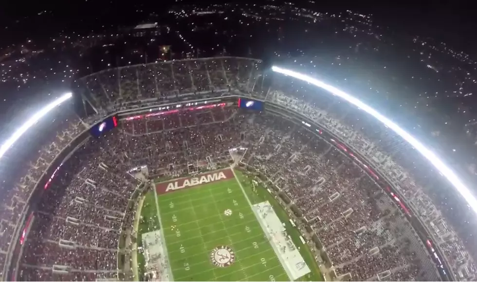 See What it Looks Like to Skydive Into Bryant-Denny Stadium at Night