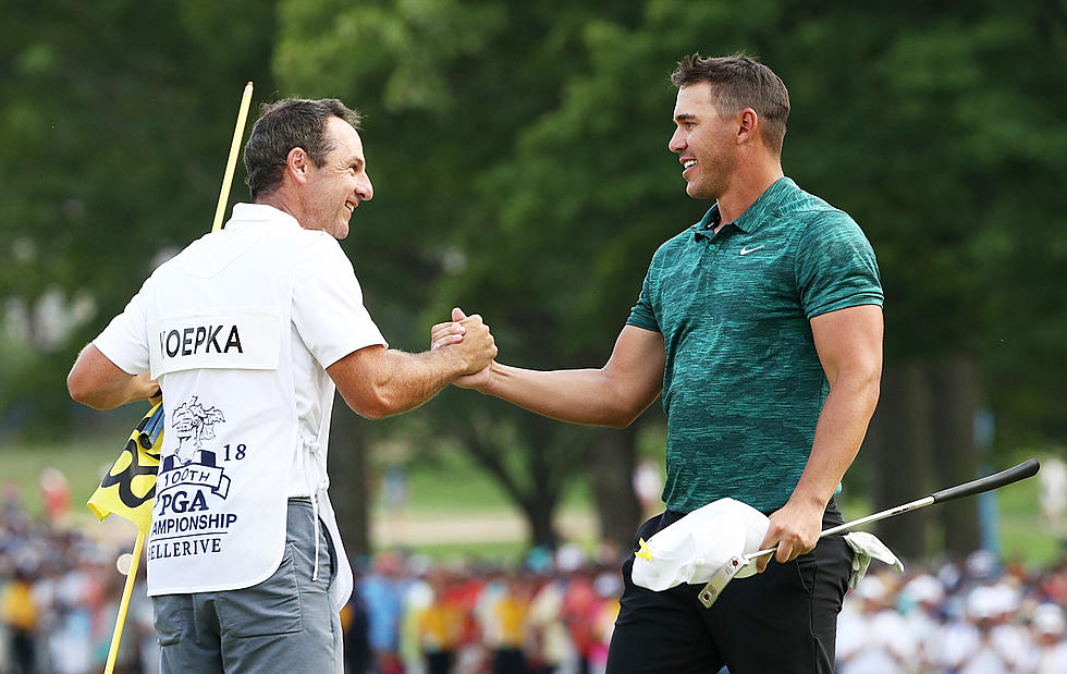 Koepka Holds off Woods to Win PGA Championship