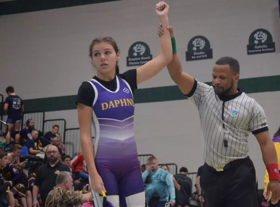 Former High School Student Inspires Women’s Wrestlers
