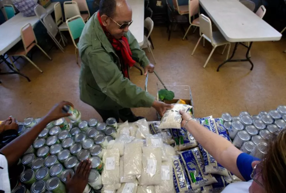 Letter Carriers Collect Donations to Stamp Out Hunger