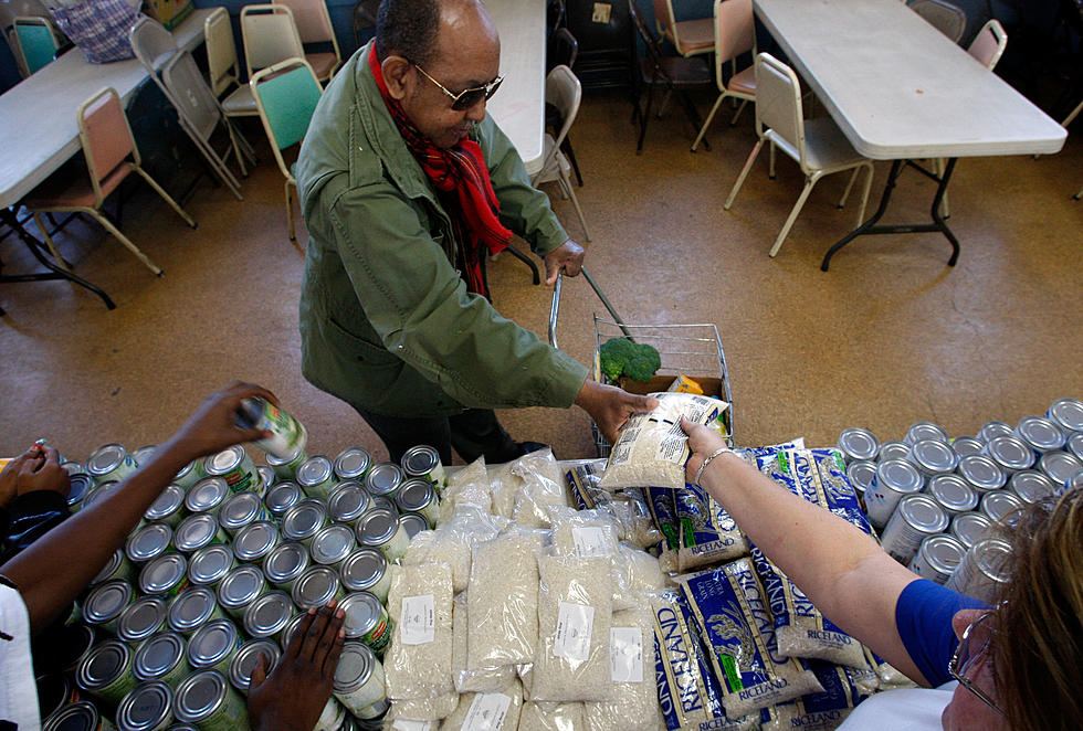 Letter Carriers Collect Donations to Stamp Out Hunger