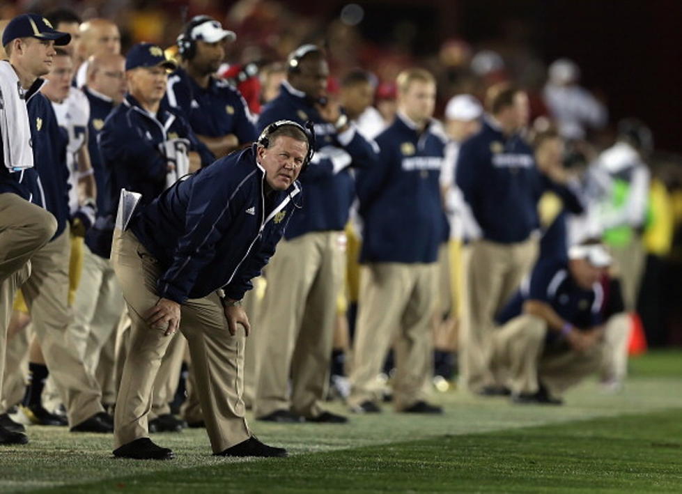 Hey College Football Coaches, Keep Your Hands to Yourselves