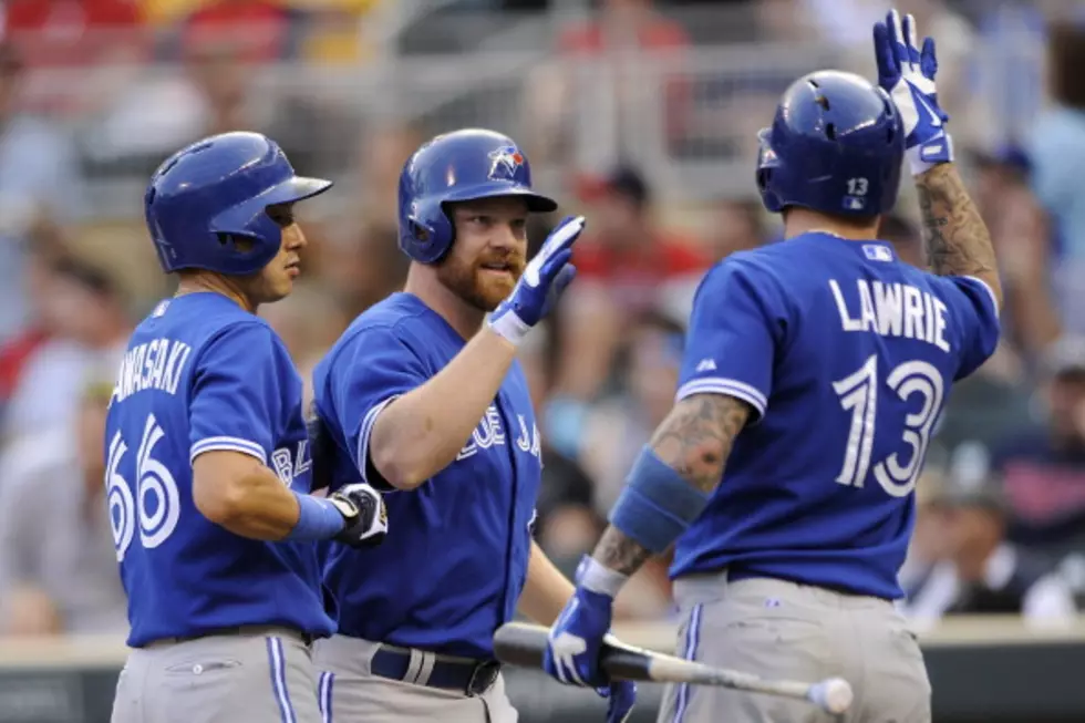 Lind Homers Twice, Drives In 6 As Jays Rout Twins