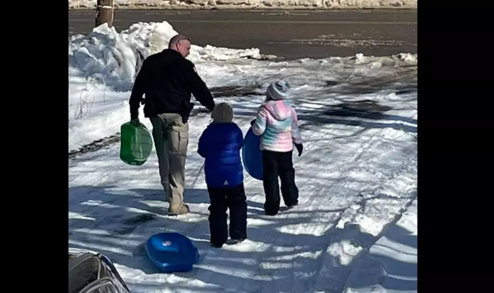 WATCH: Maine Police Chief Grabs A Sled &#038; Slides With Kids